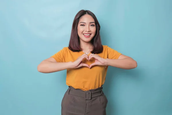Attractive Young Asian Woman Feels Happy Romantic Shapes Heart Gesture — Stock fotografie