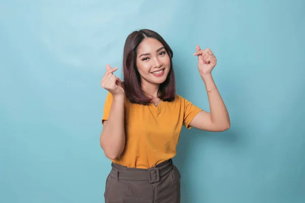 Attractive Young Asian Woman Feels Happy Romantic Shapes Heart Gesture — Stok fotoğraf