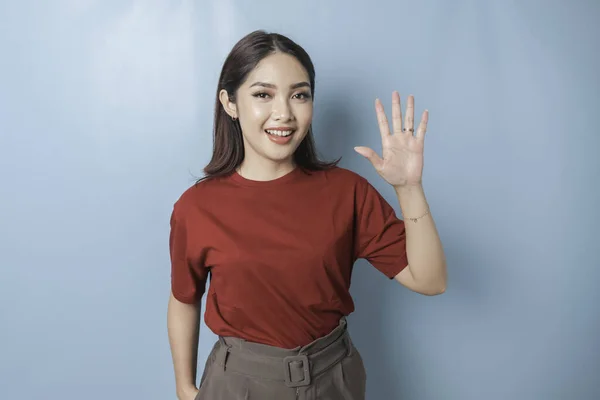 Excited Asian Woman Wearing Red Shirt Giving Number 12345 Hand —  Fotos de Stock
