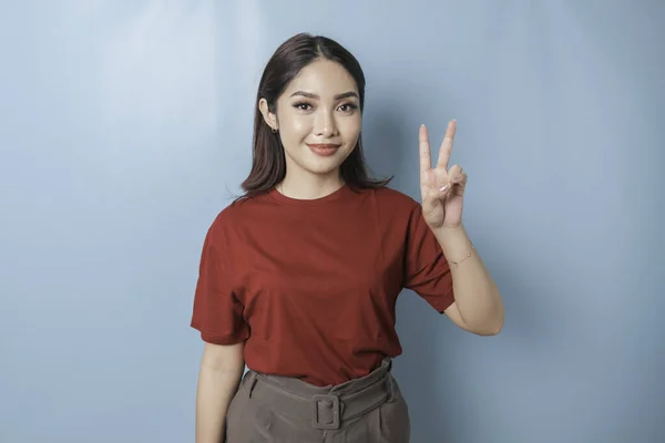 Excited Asian Woman Wearing Red Shirt Giving Number 12345 Hand — Stok fotoğraf