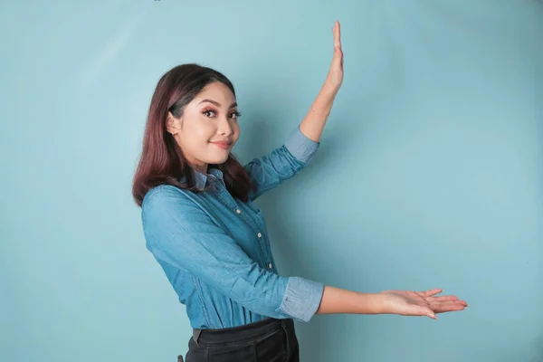 Excited Asian Woman Wearing Blue Shirt Pointing Copy Space Her — Foto de Stock