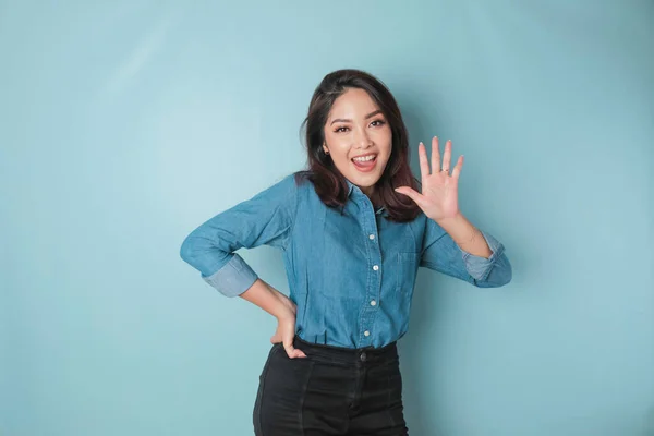 Excited Asian Woman Wearing Blue Shirt Giving Number 12345 Hand — Stok fotoğraf