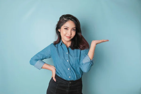 Excited Asian Woman Wearing Blue Shirt Pointing Copy Space Her — Stok fotoğraf