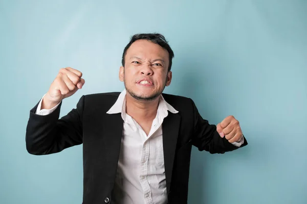 Angry Mad Face Asian Businessman Black Suit Isolated Blue Background — Stok Foto