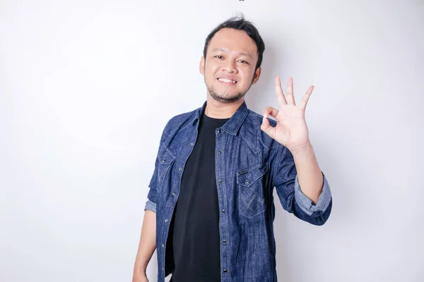 Excited Asian Man Wearing Navy Blue Shirt Giving Hand Gesture — Stock Photo, Image