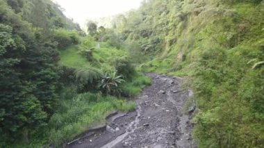 Aerial view of Valley with small river in Pluyon Merapi Mount, Indonesia.