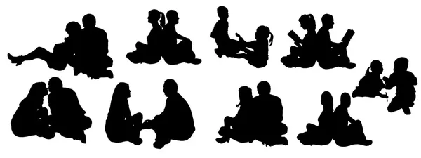 Vector illustration with family silhouettes. — Stock Vector