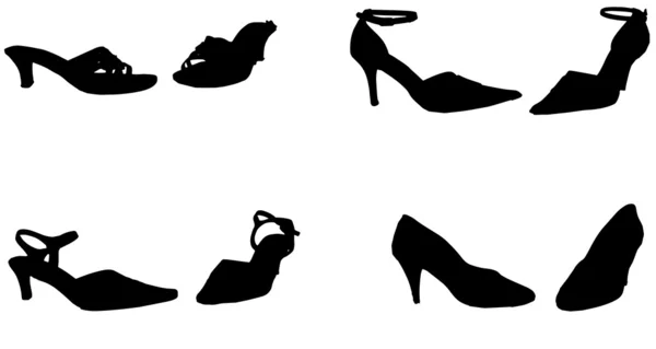 Silueta vectorial de zapatos . — Vector de stock