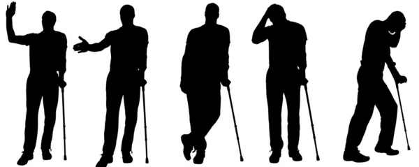 Vector silhouettes of people with crutches. — Stock Vector