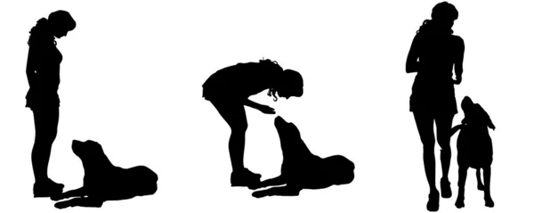 Vector silhouet van een vrouw met een hond. — Stockvector