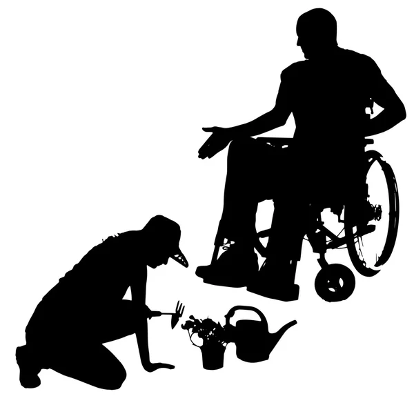 Insanların tekerlekli sandalyede Vector silhouettes. — Stok Vektör