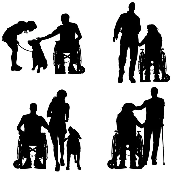 Vector silhouettes of people in a wheelchair. — Stock Vector