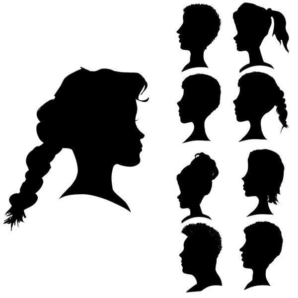 Silhouette vettoriali di facce diverse . — Vettoriale Stock