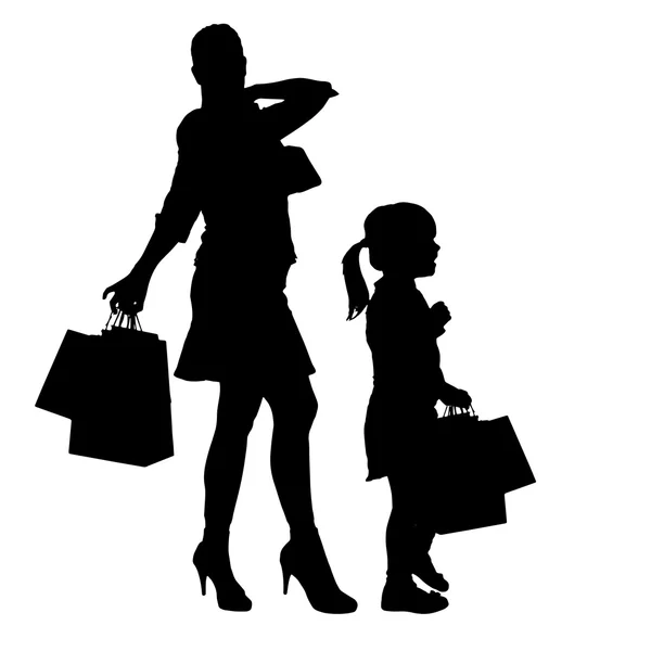 Silhouette vectorielle d'une famille . — Image vectorielle