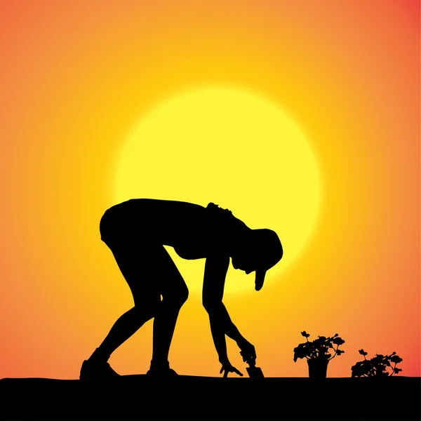 Vector silhouet van een tuinman. — Stockvector