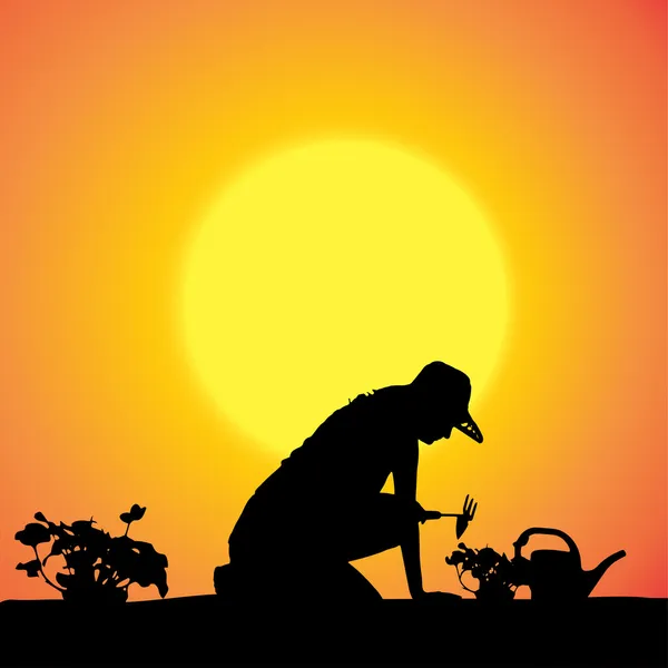 Vector silhouet van een tuinman. — Stockvector