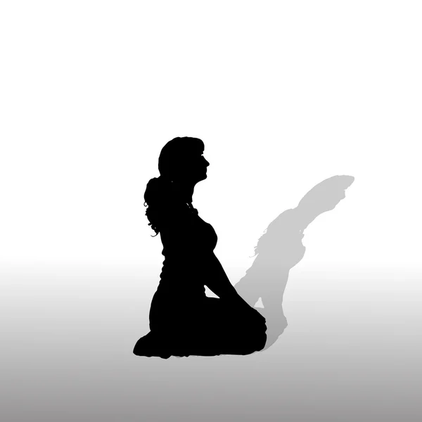 Silhouette vettoriale di una donna . — Vettoriale Stock