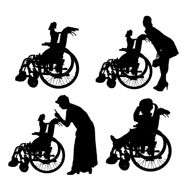 Siluetas vectoriales de personas en silla de ruedas . — Archivo Imágenes Vectoriales