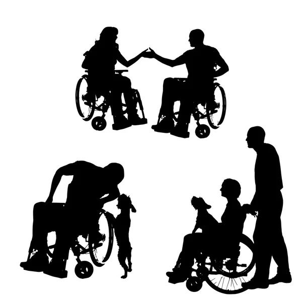 Vector silhouettes of people in a wheelchair. — Stock Vector