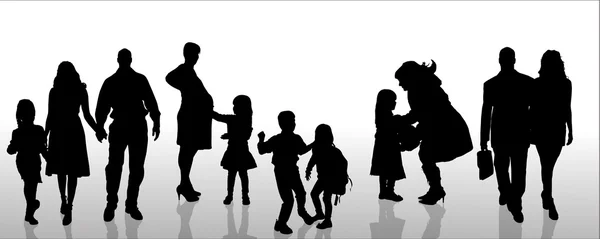 Vector silhouet van familie. — Stockvector