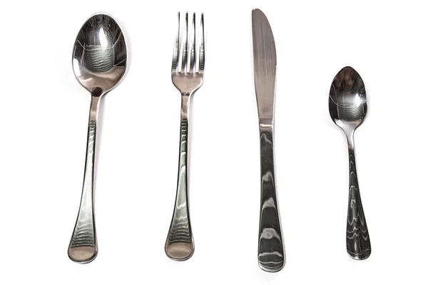 Spoons, fork, knife and teaspoon — Stock Photo, Image