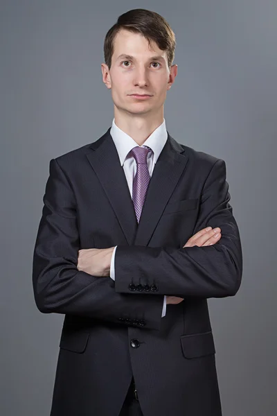 Portrait of a businessman with arms crossed — Stock Photo, Image