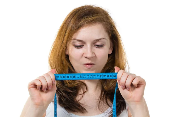 Girl with meter in her hands — Stock Photo, Image