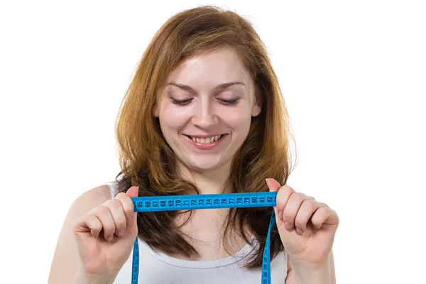 Girl with meter in her hands — Stock Photo, Image