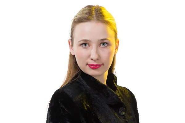 Retrato de uma mulher de casaco com auriculares — Fotografia de Stock