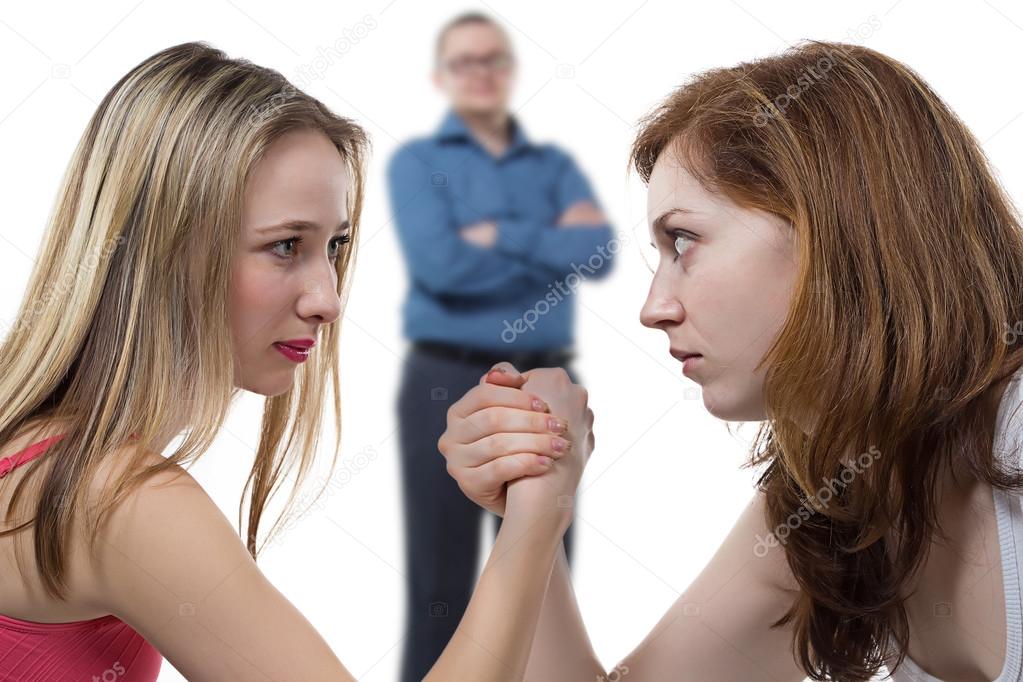 Two girls struggle for man