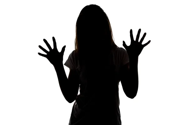 Silhouette of teenager girl with open hands — Stock Photo, Image