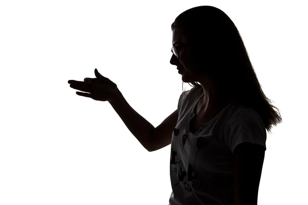 Silhouette of teenager making shadows play — Stock Photo, Image