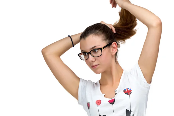 Tiener meisje met glazen en ponytail — Stockfoto