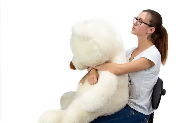 Serious teenager with teddy bear — Stock Photo, Image