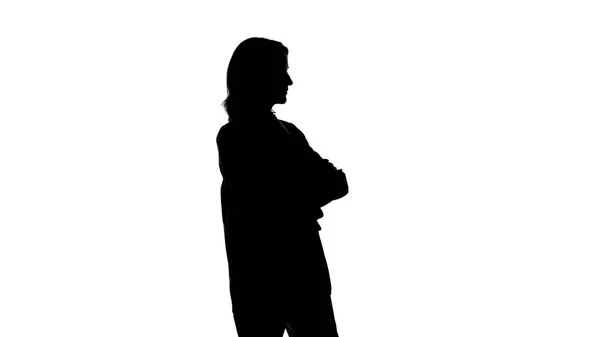 Foto di donne in attesa silhouette in giacca tuta con le braccia incrociate — Foto Stock