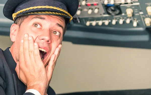 Panic in the airplane with pilot screaming for sudden failure — Stock Photo, Image