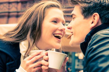 Young Couple lovely enjoying a cup of Coffee clipart