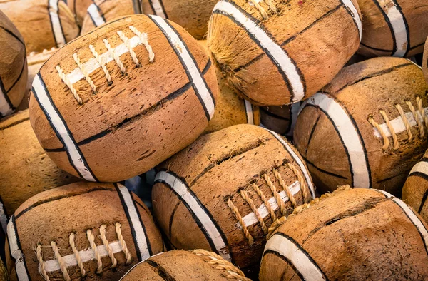 Coconuts painted as american football icons — Stock Photo, Image
