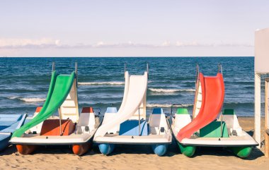 Paddle Boat at italian Beach clipart