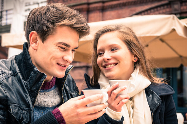 Young Couple lovely enjoying a cup of Coffee