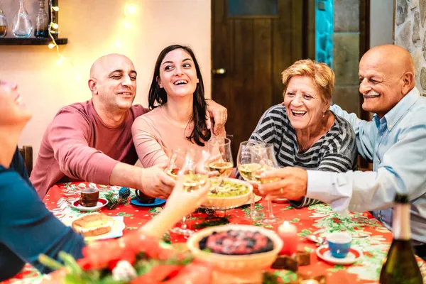 Mixed Age Group Toasting White Wine Having Fun Winter Holiday — Stock Photo, Image