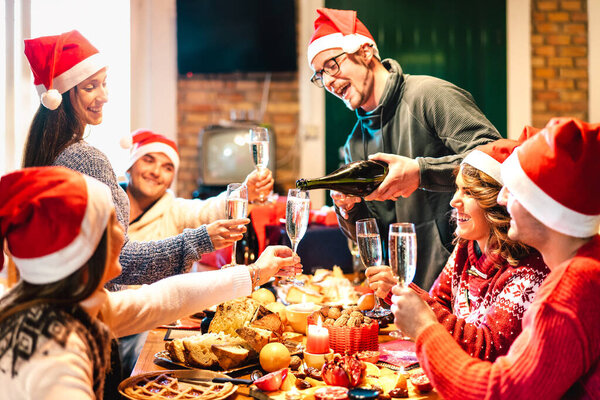 Millenial Friends Santa Hats Celebrating Christmas Champagne Sweets Food Log Stock Image