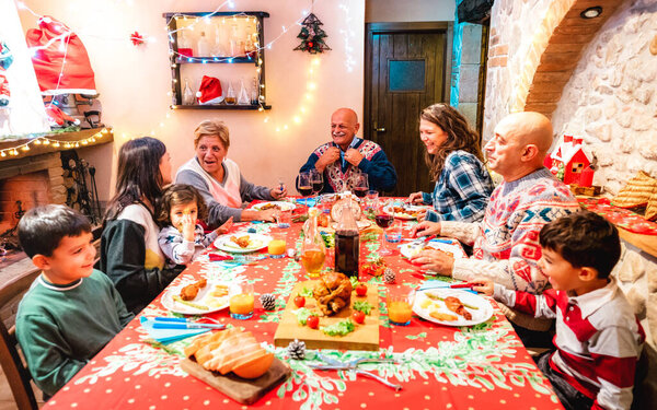 Large Multi Generation Family Having Fun Holidays Dinner Event Winter Royalty Free Stock Photos