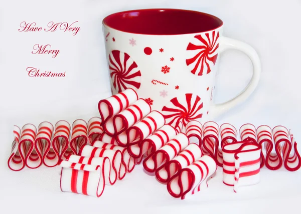 Merry Christmas Peppermint Red and White Christmas Ribbon Candy and Mug Greeting — Stock Photo, Image