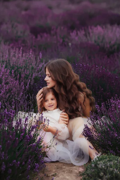 Little Girl Mother Long Flowing Hair Sitting Bushes Lavender Field — Stock Photo, Image