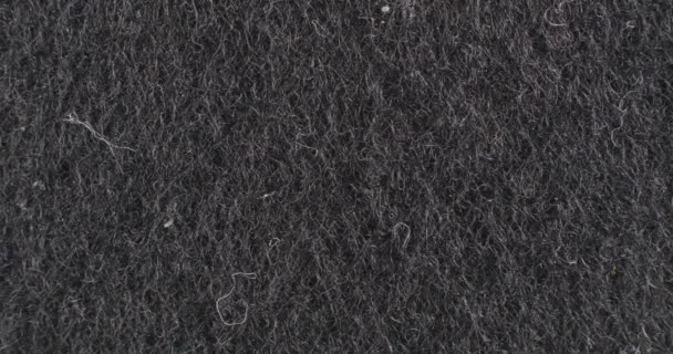 Felt texture close-up. Black background. Macro tissue. — Stock Video