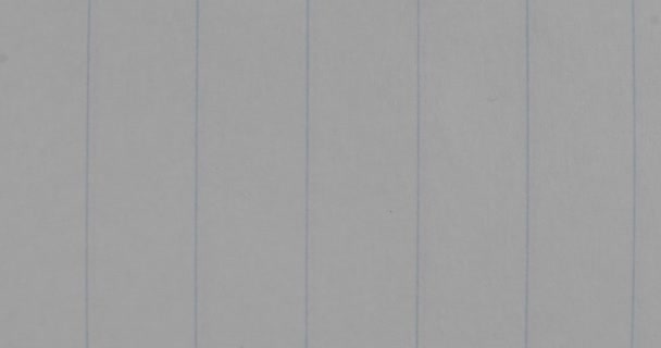 Makro lakan till linje. Närbild av texturen på papperet i linjalen. Skrivremsor. — Stockvideo