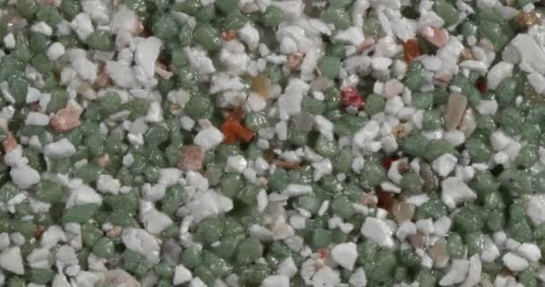 Närbild textur av fina marmor chips. Flerfärgade. — Stockvideo