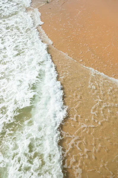 Wave of the sea on the sandy beach — Stock Photo, Image
