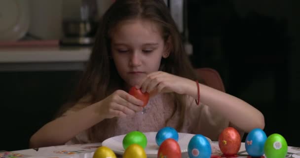 Girl Glues Decorative Stickers Easter Eggs Folds Them Easter Eggs — Stockvideo